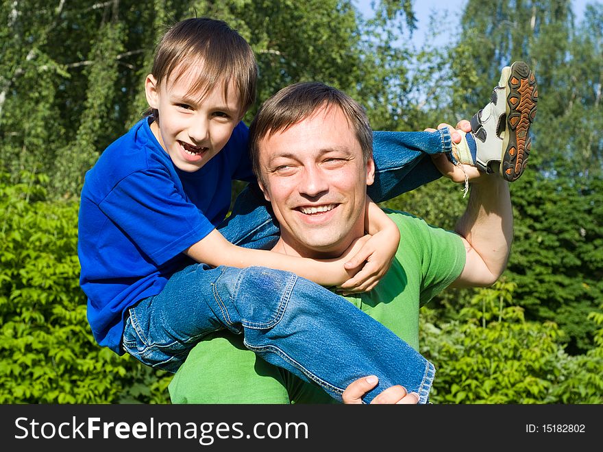 Father with his son in a park