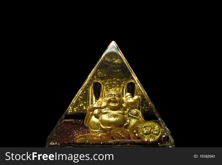 Golden Buddha closed in a pyramid. Golden Buddha closed in a pyramid