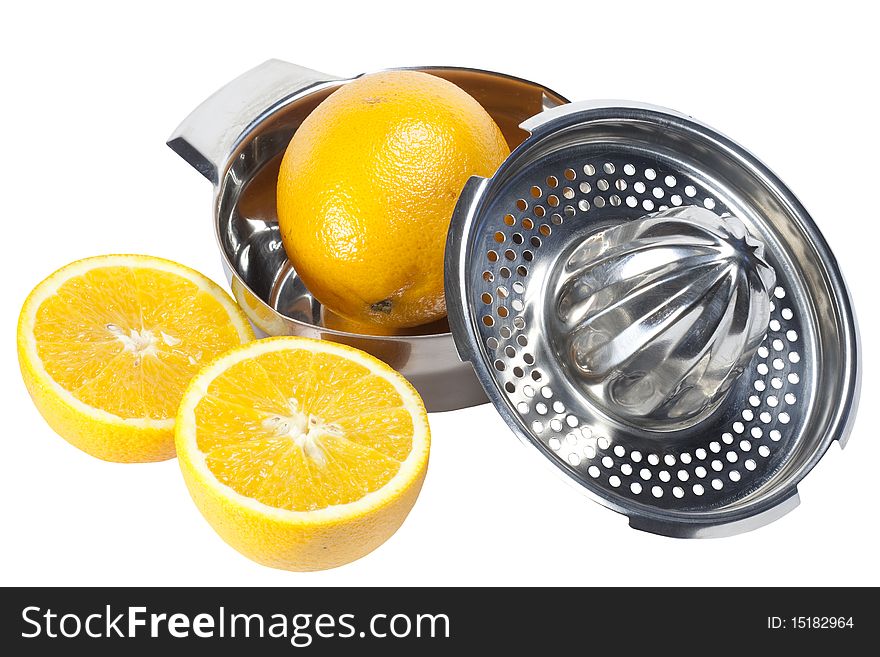 Orange and manual juicer is isolated on a white background