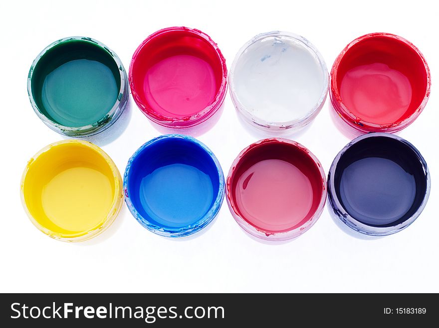 Colorful watercolour paints on white background
