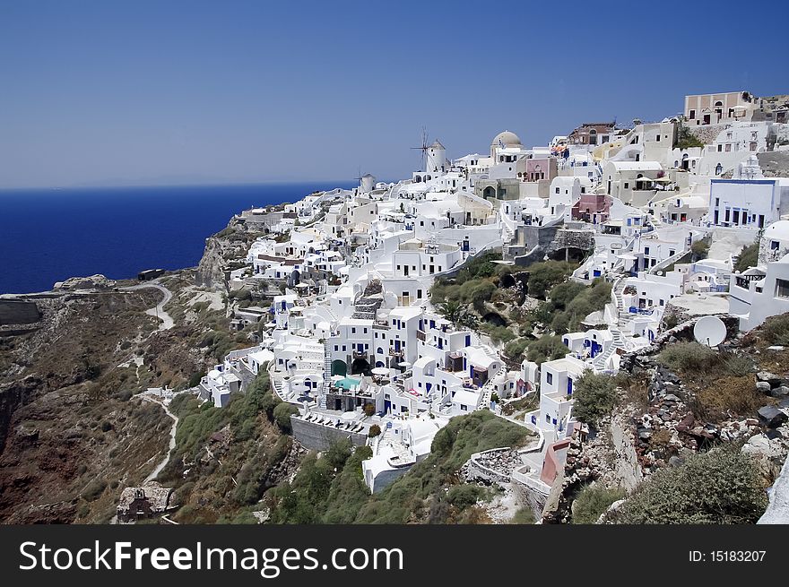 Santorini view with white houses and sea