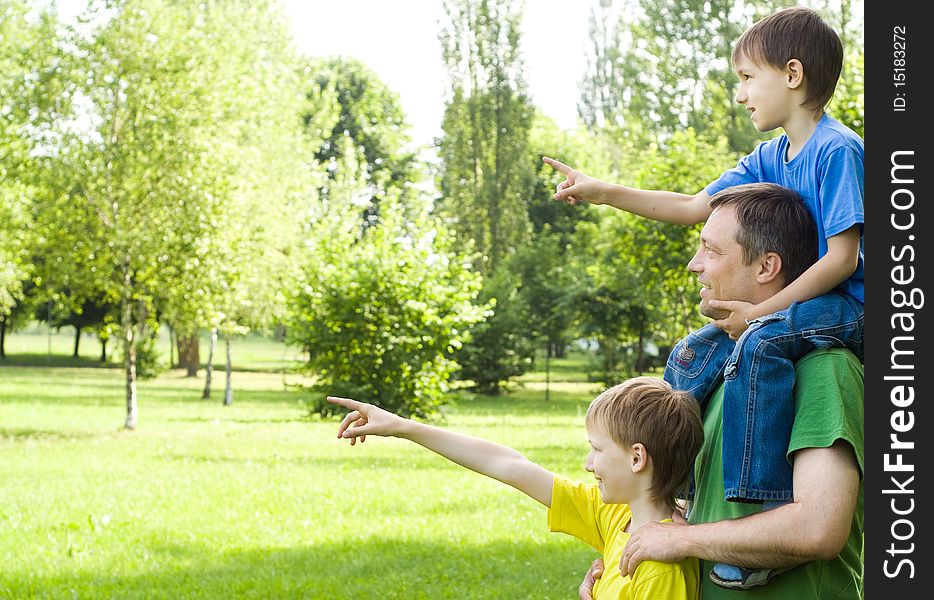 Dad with young children outdoors. Dad with young children outdoors