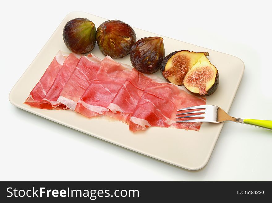Fresh fig with ham  on white background