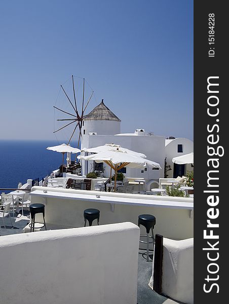 Santorini view with windmills