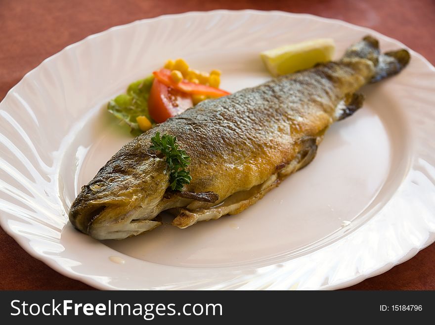 Fish meal,grilled trout with cream butter