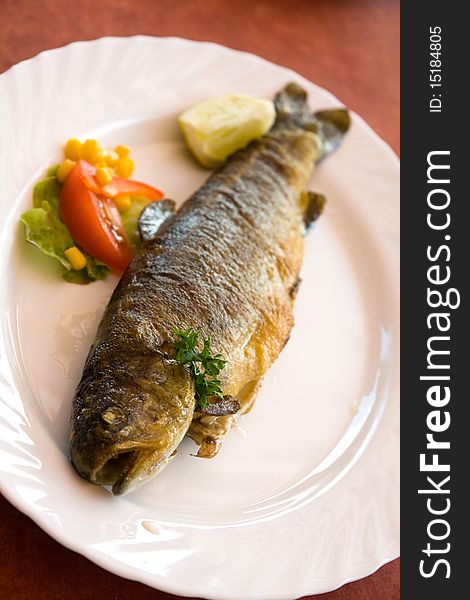 Fish meal,grilled trout with cream butter