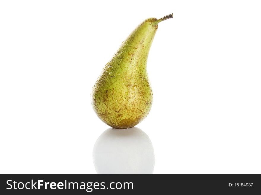 Pear, shot on a white background. It has water droplets and is a frontal view