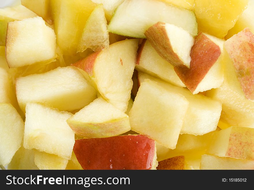 Background of apples, oranges, peaches, pears and orange juice. Fruit salad