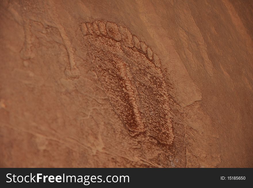 Footprints carved into a rock wall at Wadi Rum, a UNESCO World Heritage site in Jordan. Footprints carved into a rock wall at Wadi Rum, a UNESCO World Heritage site in Jordan.