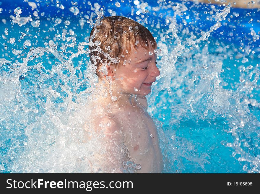 Playing in water on a hot sunny day. Playing in water on a hot sunny day