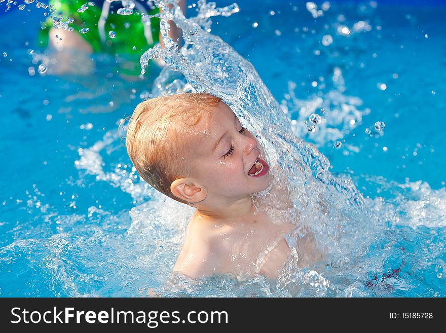 Playing in water on a hot sunny day. Playing in water on a hot sunny day