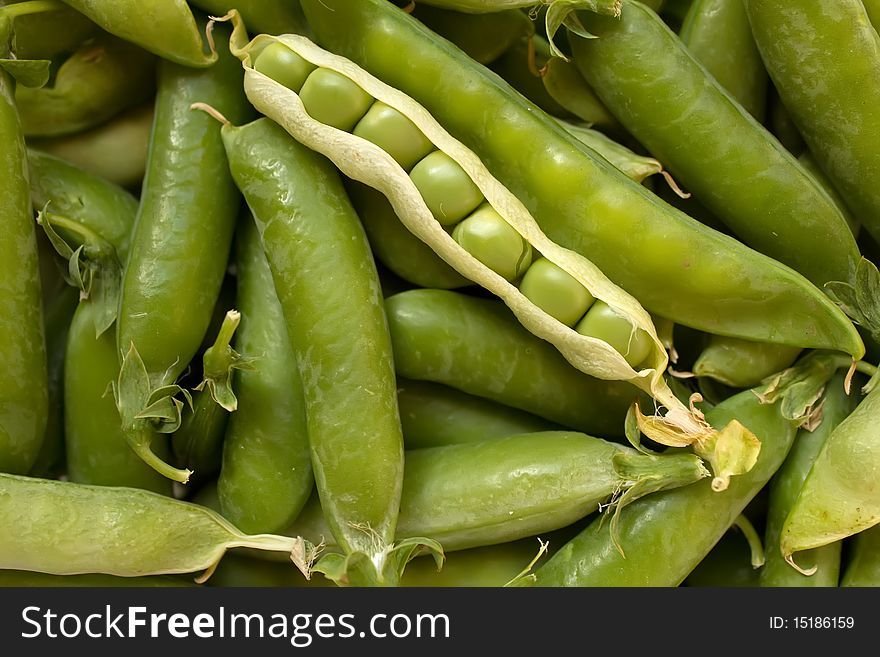 Vegetables  peas  fresh  an abstract background