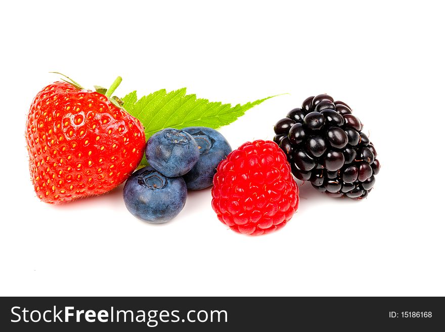Strawberry blueberry raspberry and blackberries on white background