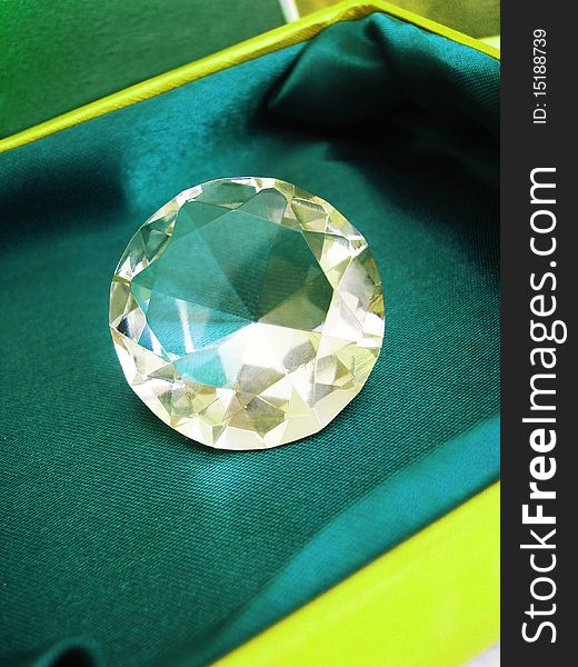 Beautiful diamond crystal on green box