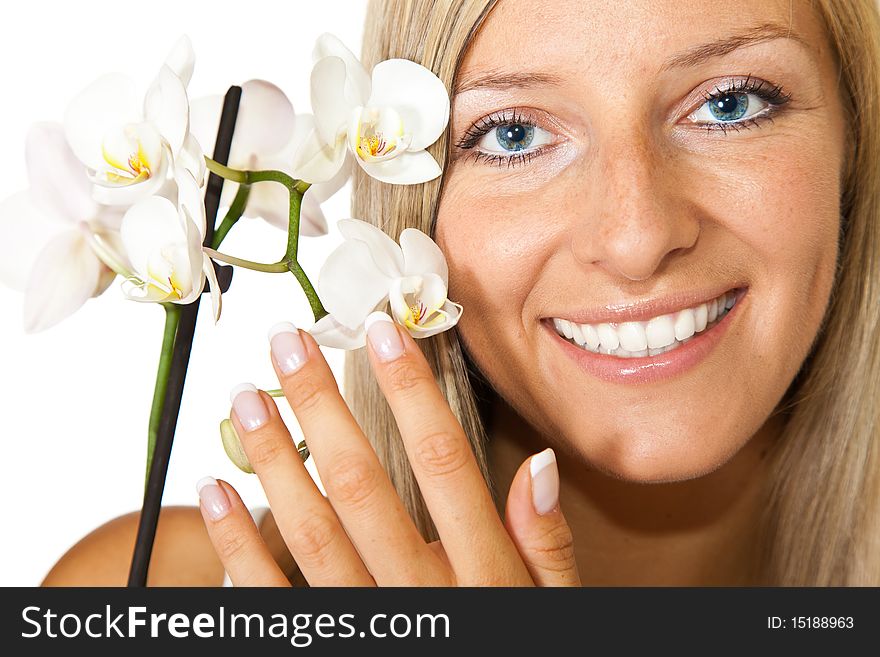 Caucasian woman with orchid flowers