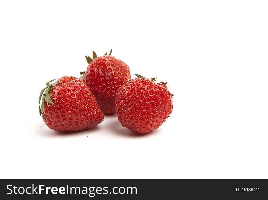 Three Fresh Strawberries on White Isolated Background. Three Fresh Strawberries on White Isolated Background