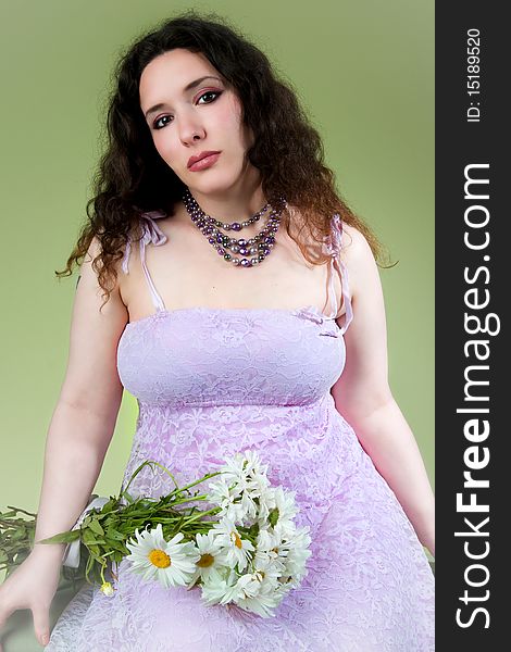 Beautiful young woman in lacy lavender dress. Beautiful young woman in lacy lavender dress