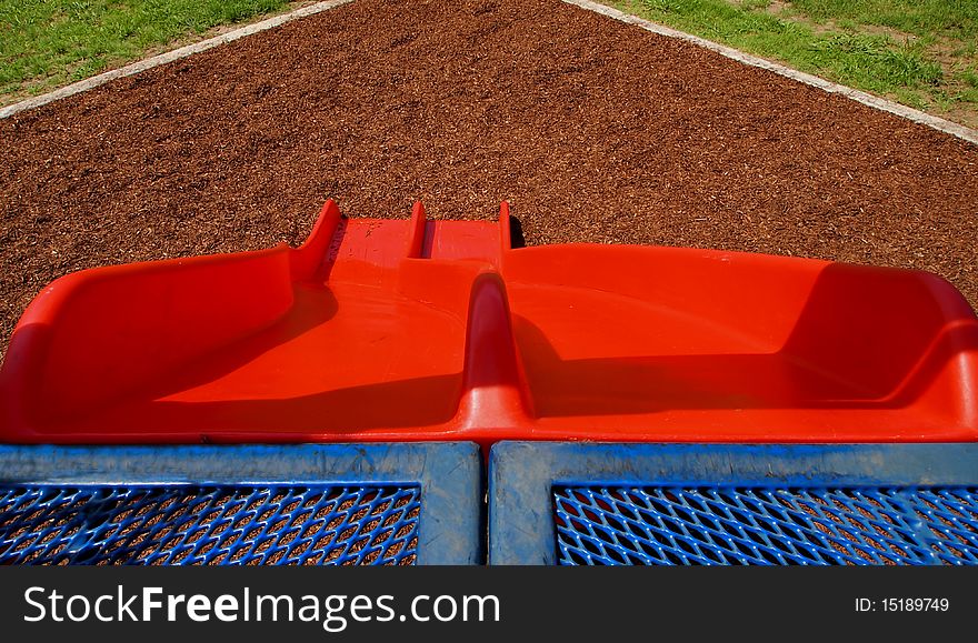 Playground slides on summer day looking downward