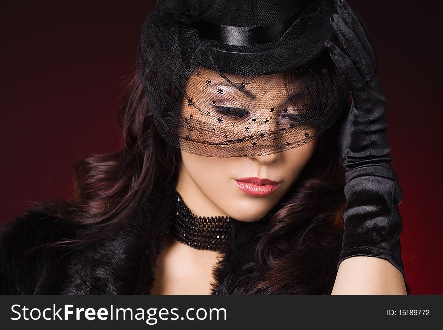 Sexy fashionable woman in a hat