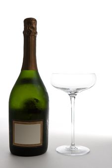 Champagne Bottle Next To An Empty Glass Royalty Free Stock Photos Champagne Bottle Next To An Empty Glass Royalty Free Stock Photos