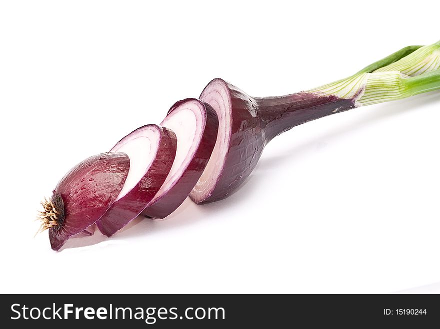 Sliced young red onion on white