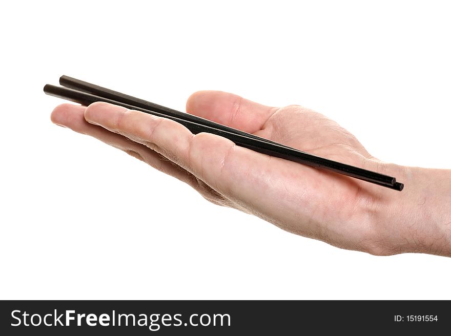 Hand with a chopsticks isolated over white