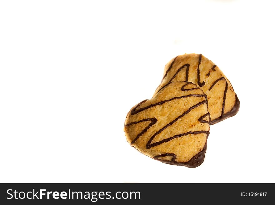 Delicious heart cookies against a white background