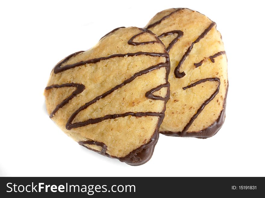 Delicious heart cookies against a white background