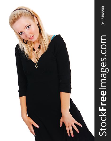 Picture of a young beautiful modest blond girl in black dress on white background. Picture of a young beautiful modest blond girl in black dress on white background