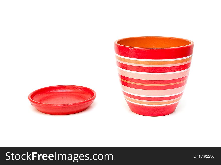 Red flowerpot isolated on white background.