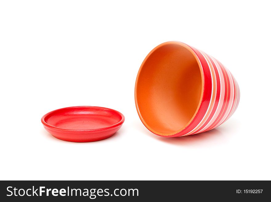 Red flowerpot isolated on white background.