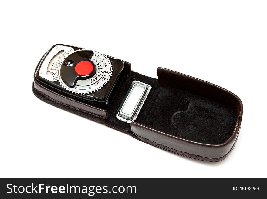 Vintage light meter isolated on white background.