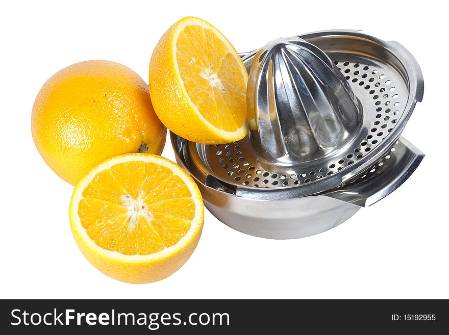 Oranges and mechanical manual juicer on a white background. Oranges and mechanical manual juicer on a white background