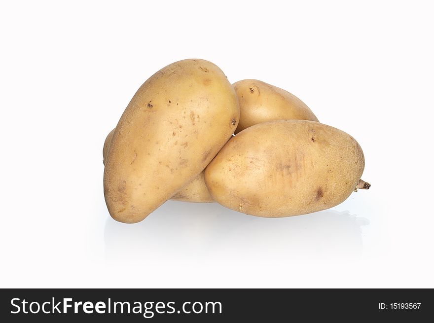 Few raw potatoes isolated on white background with clipping path