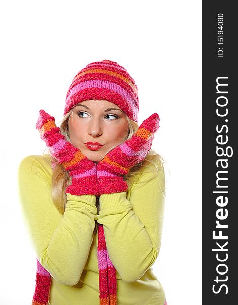 Seasonal portrait of pretty funny woman in hat and gloves smiling