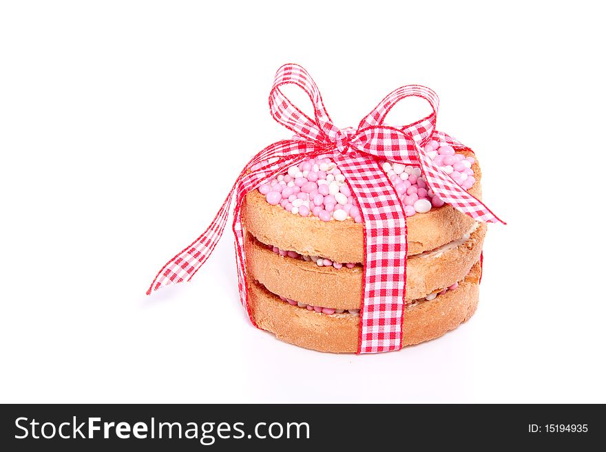 Three rusks with mice for a Dutch announcement for a newborn girl isolated over white