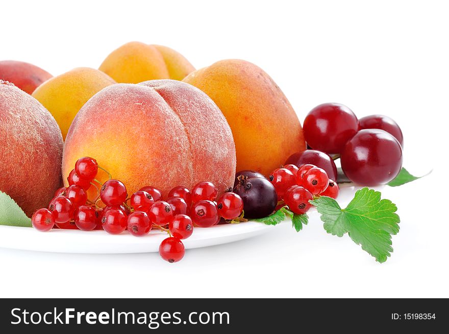 Fruits and berries on a white background