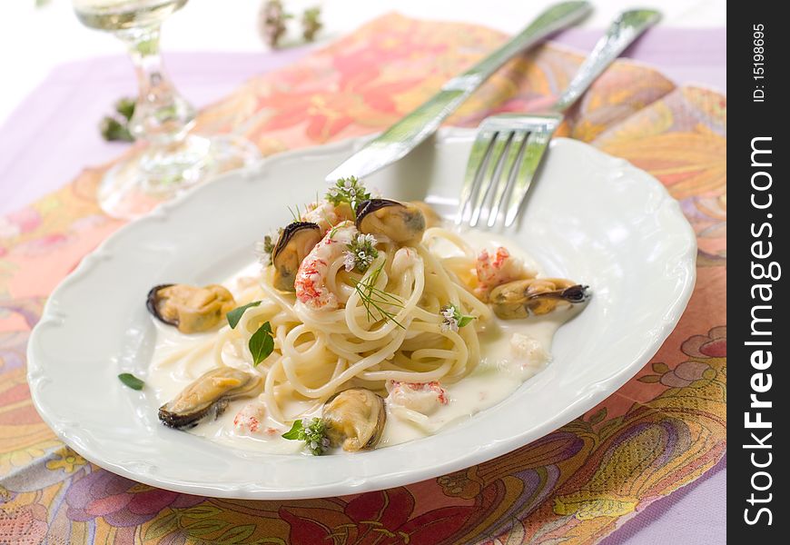 Pasta with shrimps and mussels for lunch. Pasta with shrimps and mussels for lunch