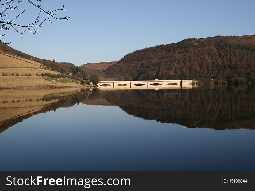 Unusual reflection image taken at Derwent reservoir and bridge (Peak District). Unusual reflection image taken at Derwent reservoir and bridge (Peak District)