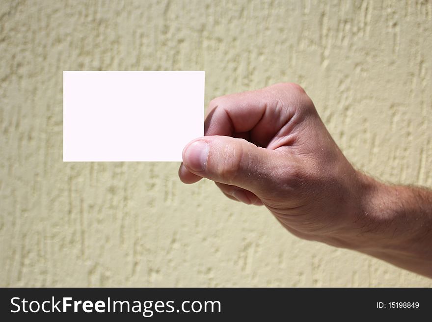 White card in a man's hand