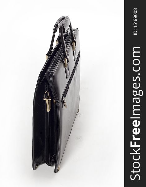 Black briefcase on a white