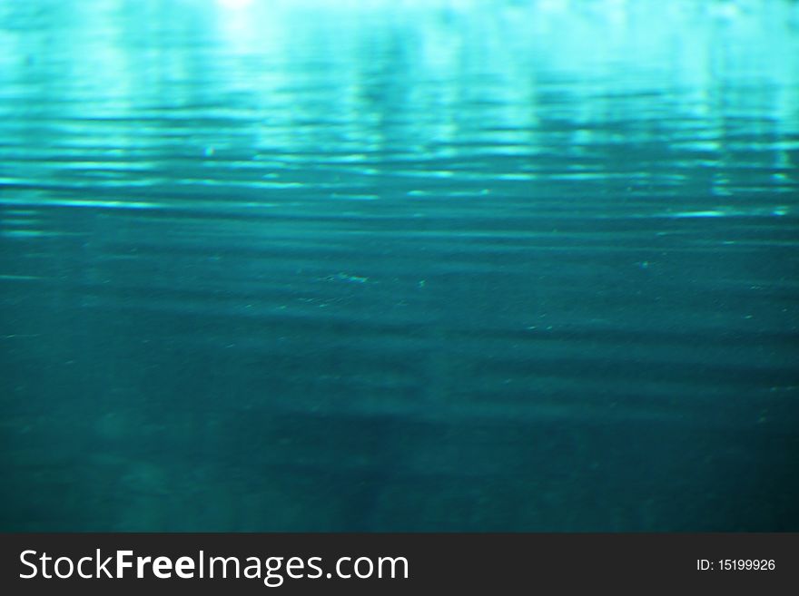 An abstract liquid background showing the surface of a liquid.