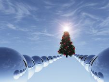 Christmas Tree In Surreal Sky Blue With Path Of Spheres Stock Photo Christmas Tree In Surreal Sky Blue With Path Of Spheres Stock Photo