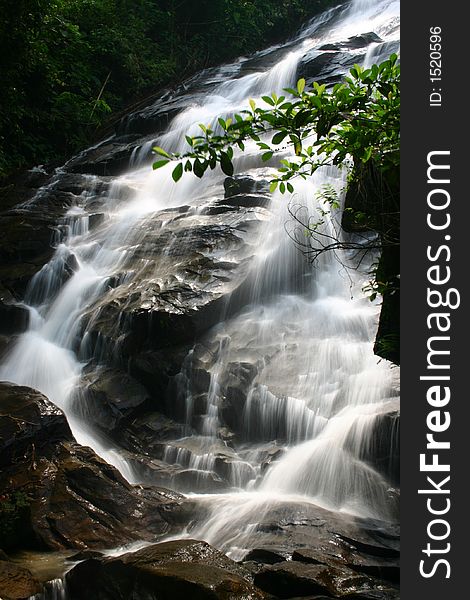 A scenic waterfall stream in silky effect.