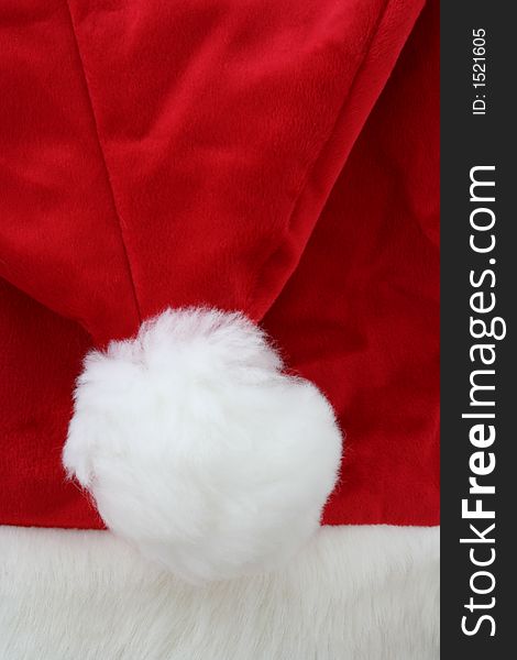 A Close-up of a Santa Claus Hat Fills the Frame. A Close-up of a Santa Claus Hat Fills the Frame.