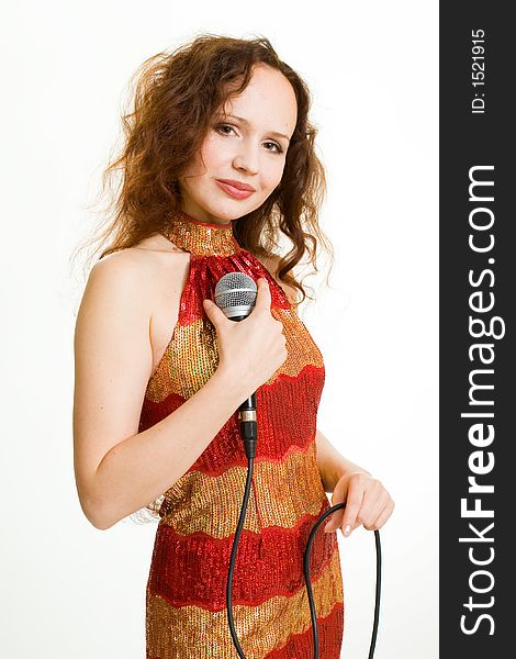 Pretty singer. Woman with microphone on white background.