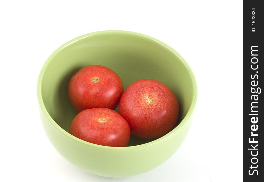 Tasty red tomatoes in bowl