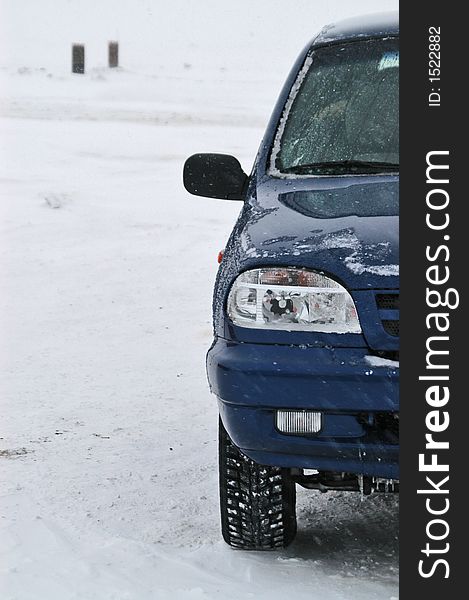 Using an SUV in Winter conditions. Windy weather not far from northern polar circle. Using an SUV in Winter conditions. Windy weather not far from northern polar circle.