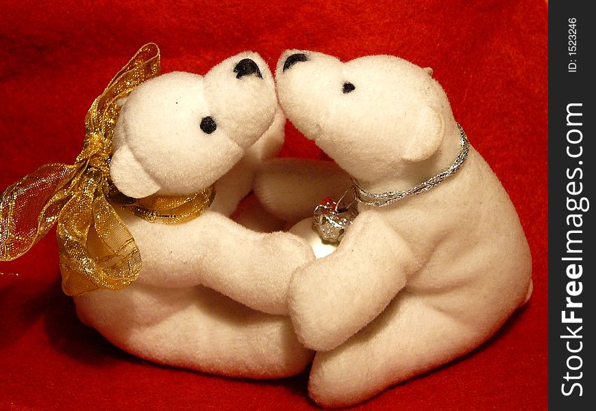 Couple toy white bears kissing in Christmas decoration. Couple toy white bears kissing in Christmas decoration