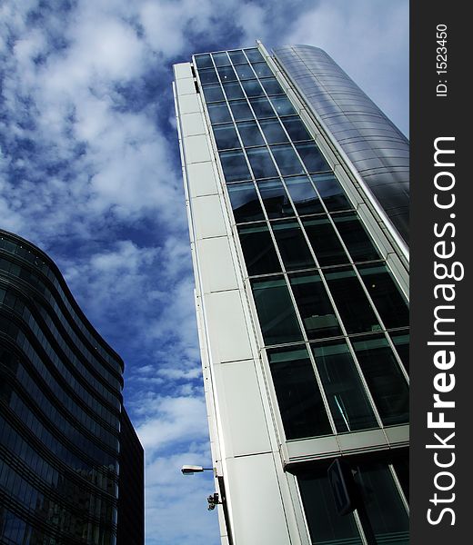 A modern glass office building in central London. A modern glass office building in central London.